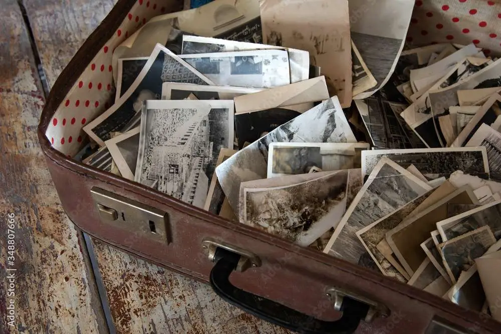 A suitcase filled with old photos.