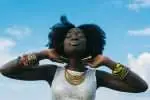 A black woman feeling a lovely and happy mood.