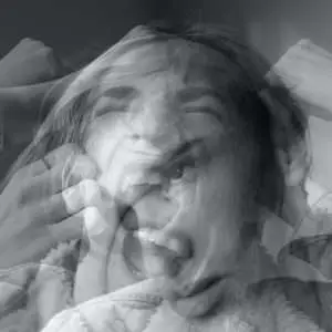 Creative photo of a person having many emotions with blurry head motion.